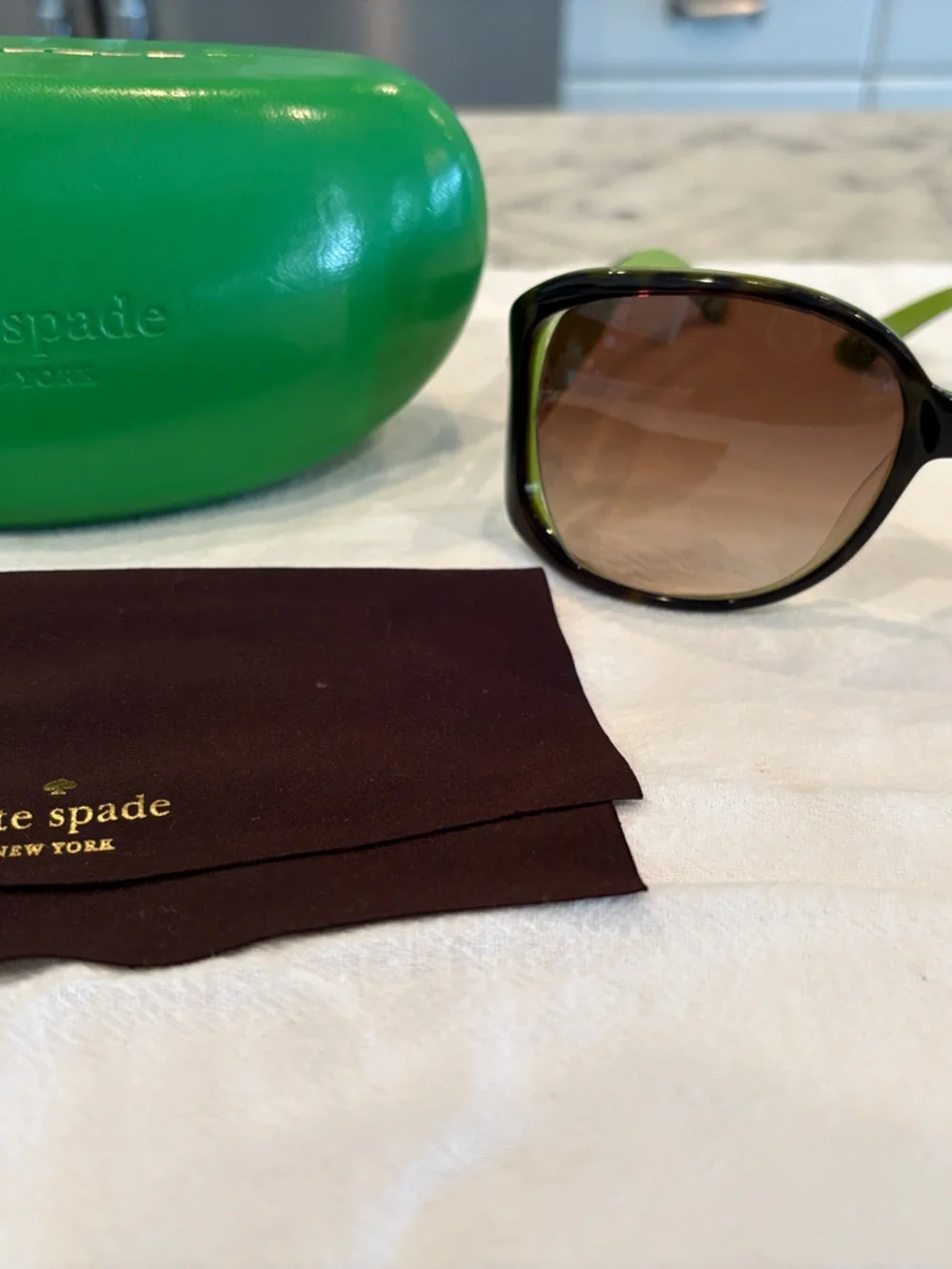 kate spade Black Frame Sunglasses with Brown Gradient Lenses and Green Case